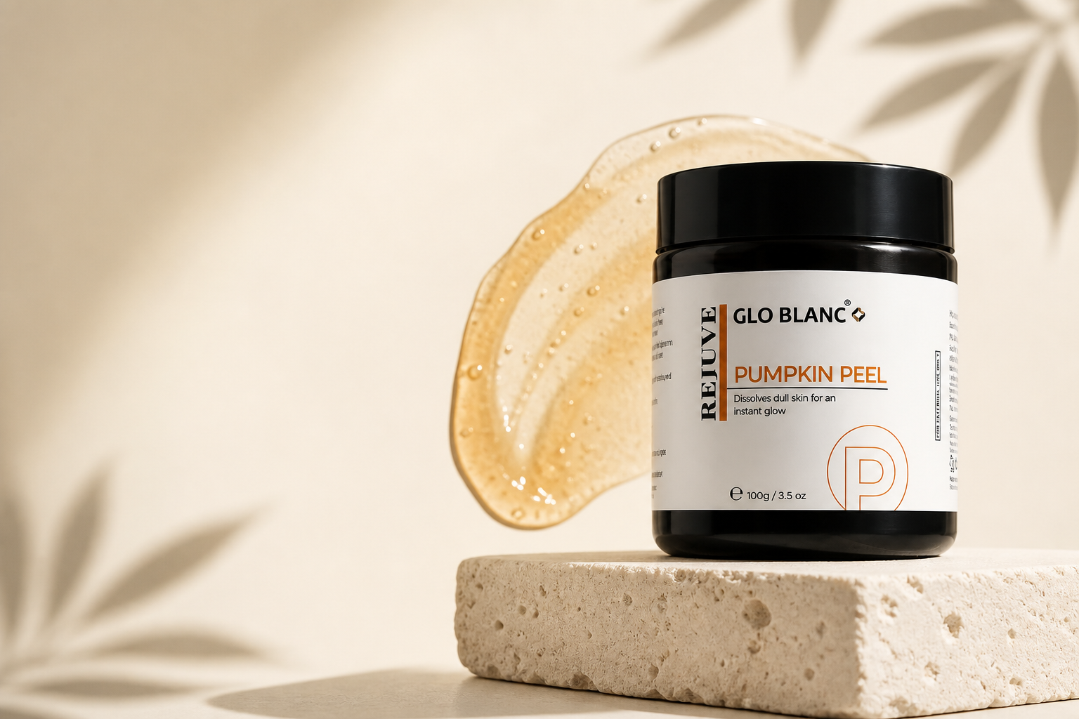 Glo Blanc Rejuve Pumpkin Peel jar on a warm limestone pedestal